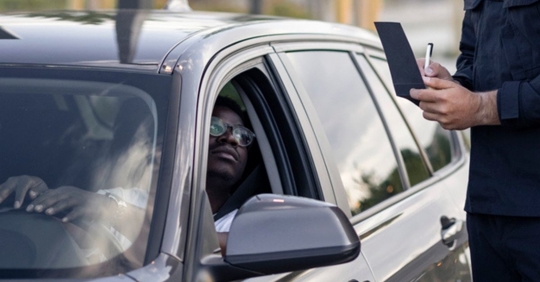 police officer stopping a driver